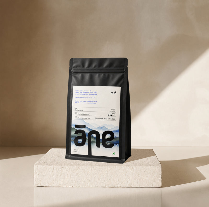 Āne Signature Blend — 250g black pack of 80:20 Arabica-chicory coffee with watercolour Western Ghats label